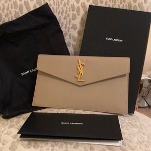 New with packing slip from YSL. Weekend poich